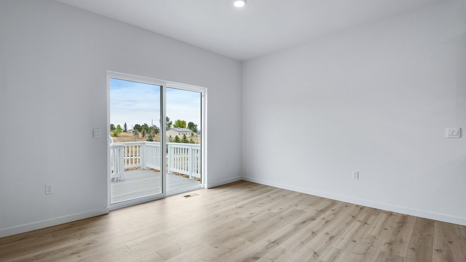 Dining area with access to the backyard in new Henley floor plan in Mead Colorado