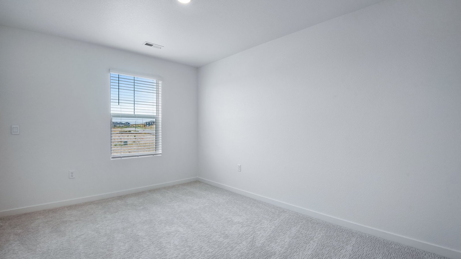 Secondary bedroom in new home in Mead Colorado