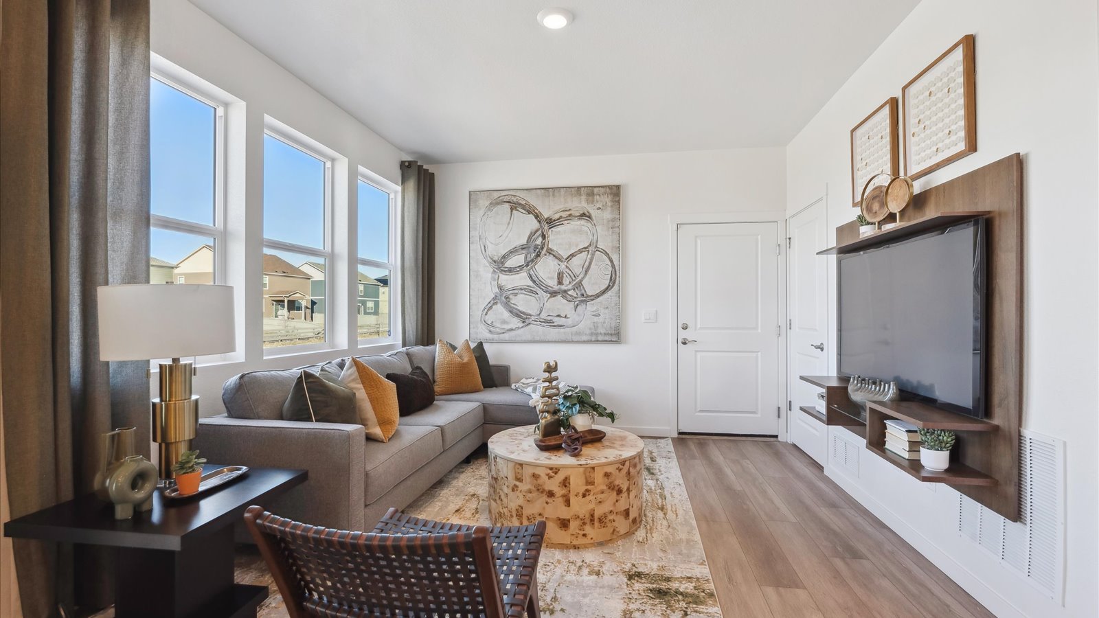 Muirfield living room in Vantage featuring bright natural light and spacious layout