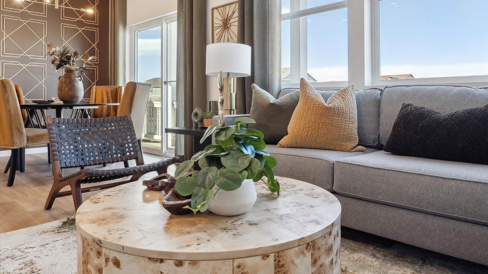 Great room in Muirfield home with seamless flow into kitchen and dining area