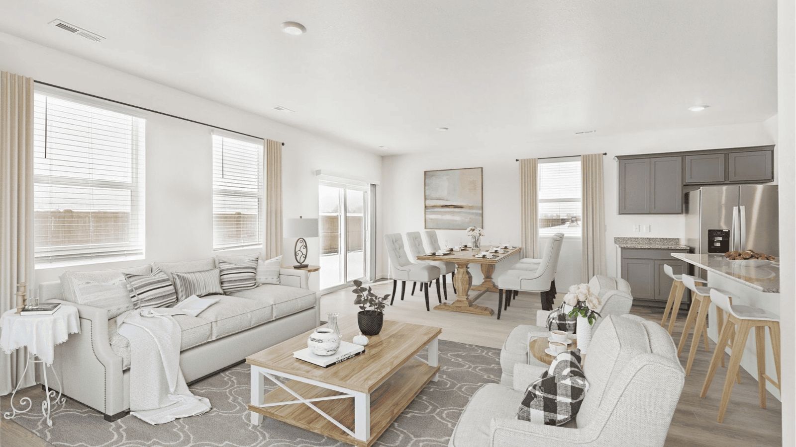 Spacious living room in the Newcastle floor plan featuring an open layout and abundant natural light.