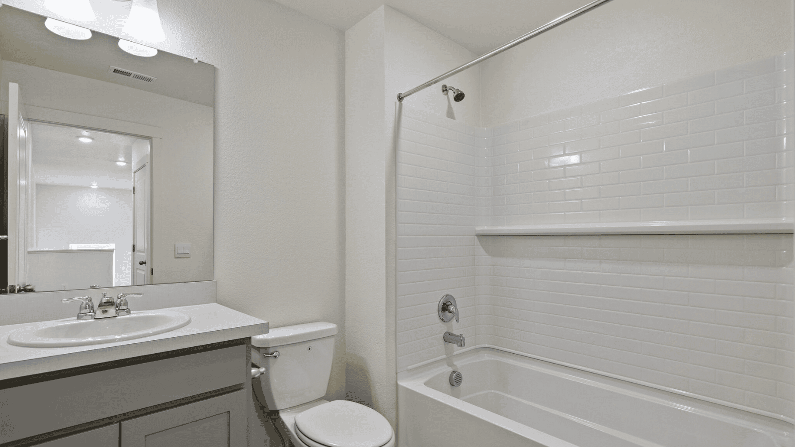 Modern bathroom in the Sienna home featuring contemporary fixtures and functional design.