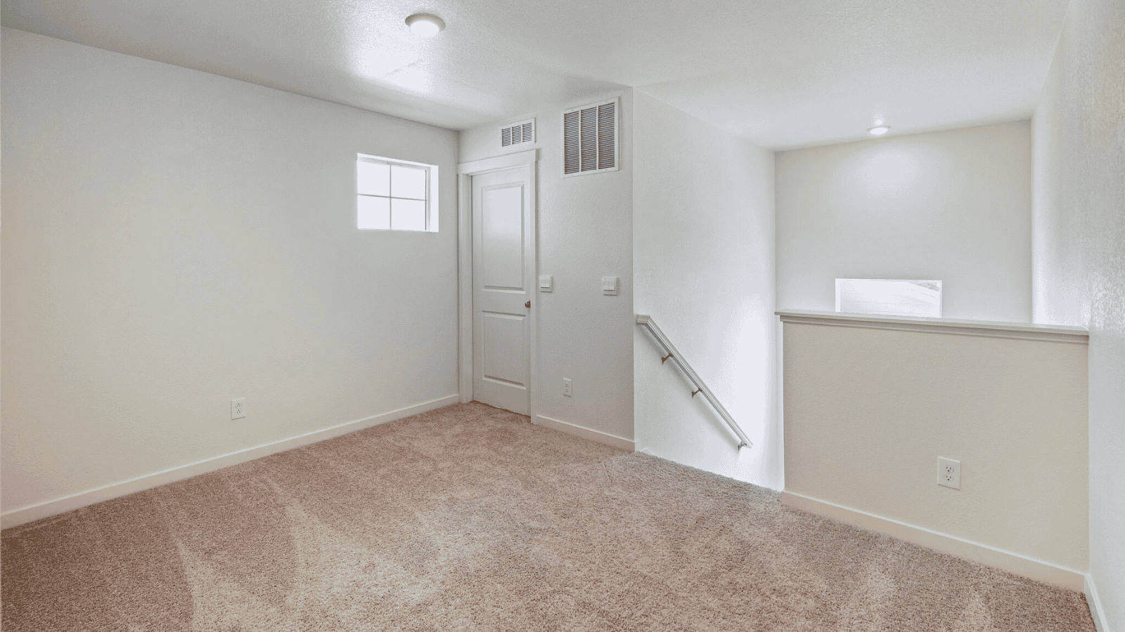 Versatile loft in the Sienna floor plan offering flexible space for a home office, media room, or play area.E