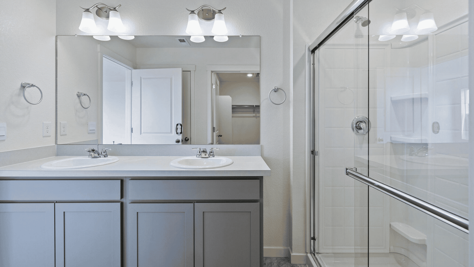Bright and stylish bathroom in the Sienna home with convenient storage and modern finishes.