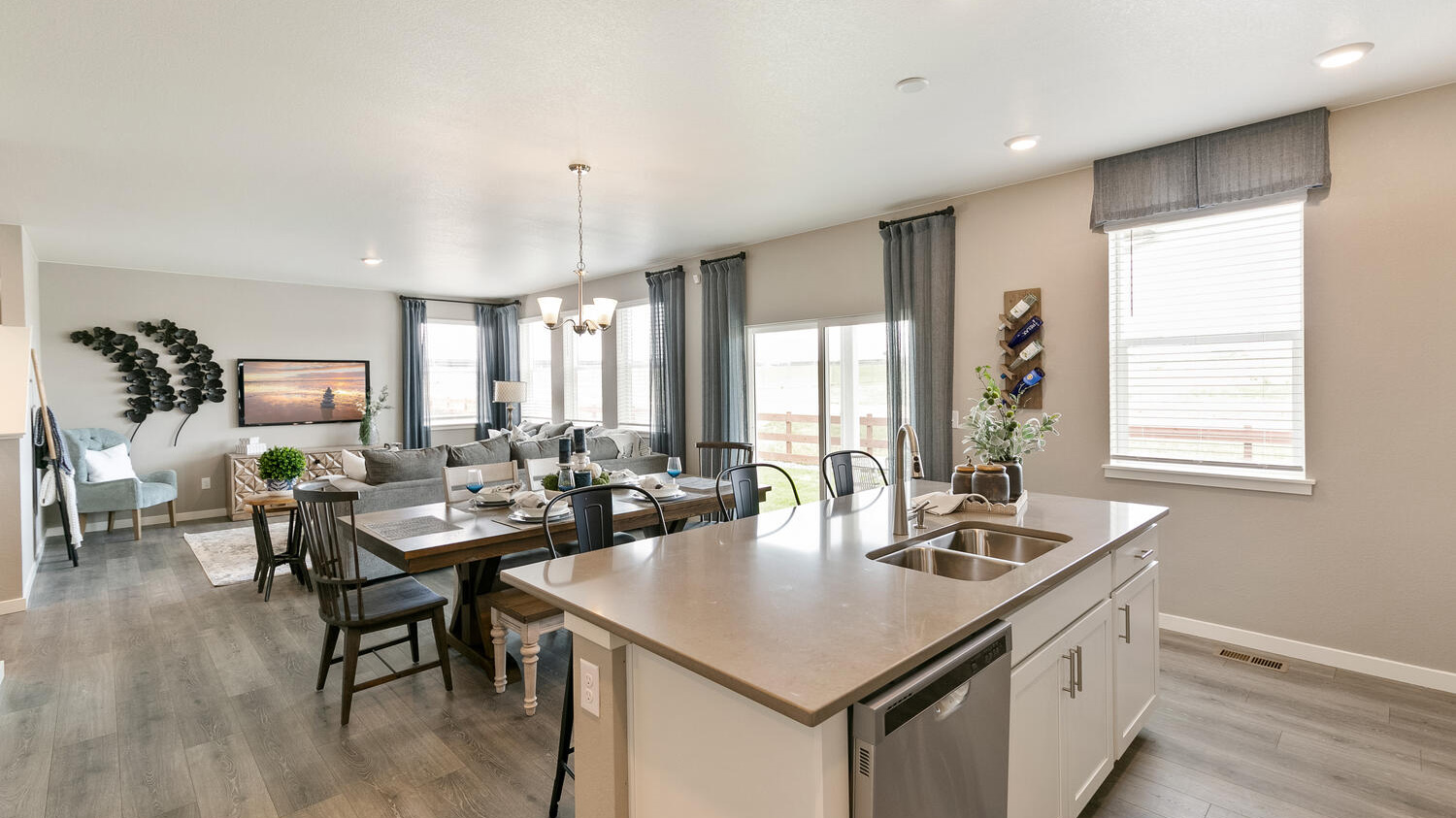 Large center island providing additional seating, workspace, and a natural gathering place for family and guests.