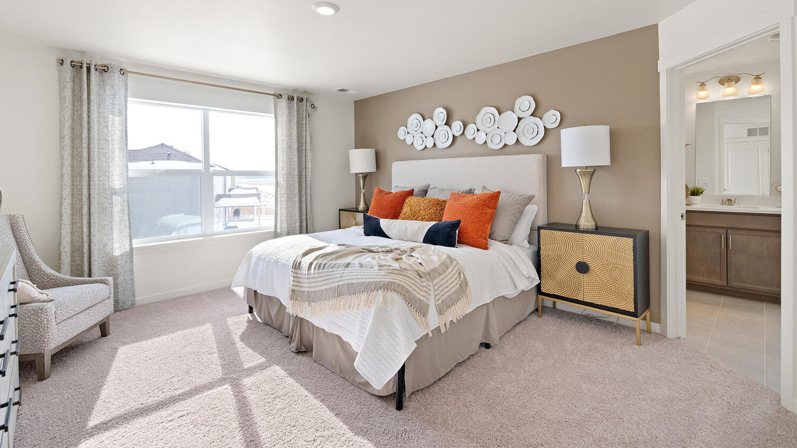 Spacious primary suite with abundant natural light and a private retreat-like atmosphere.