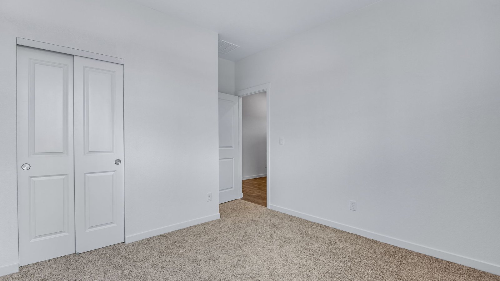 bedroom with large closet in fort lupton home