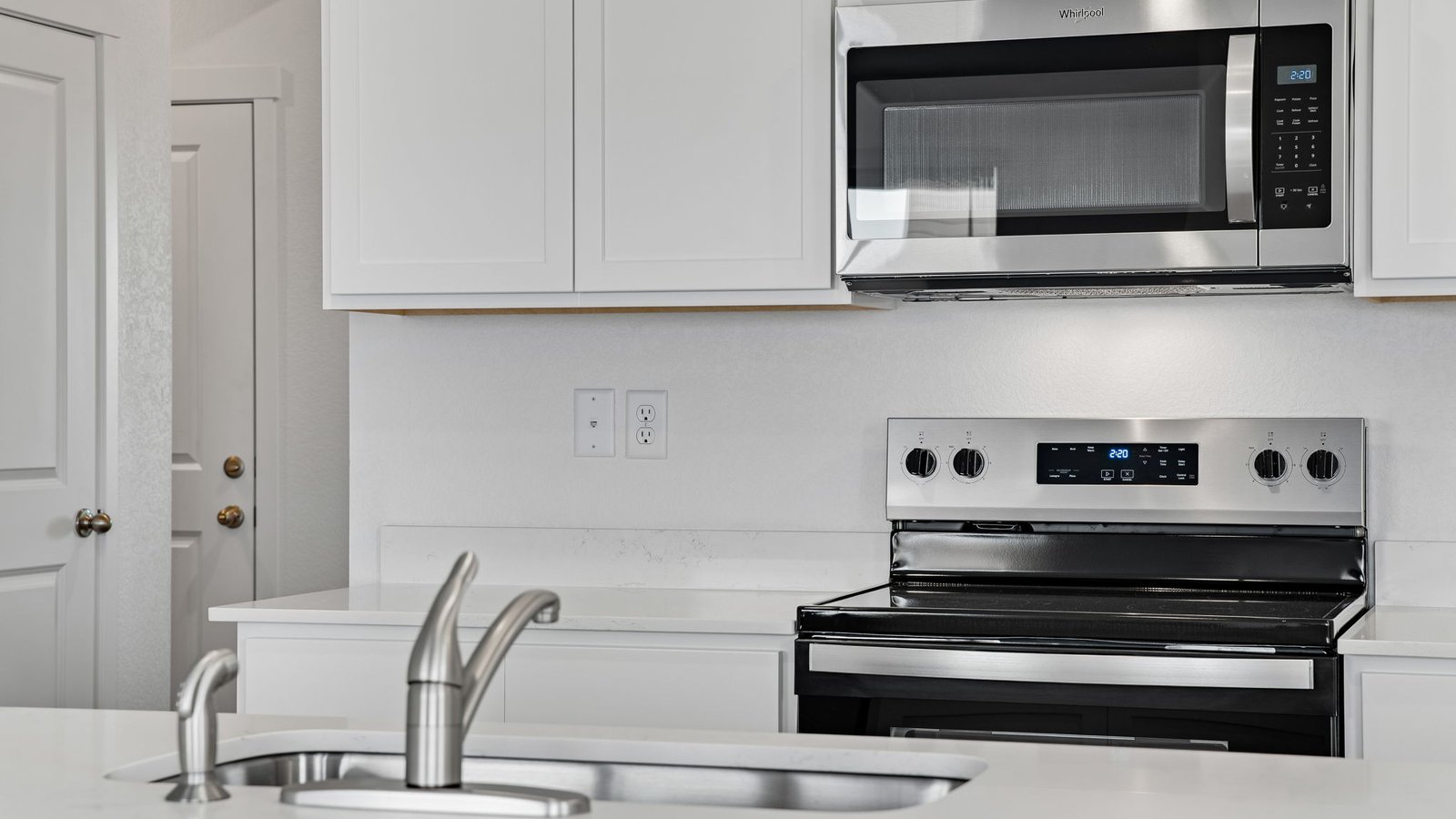 stove and microwave in new construction home fort lupton, com