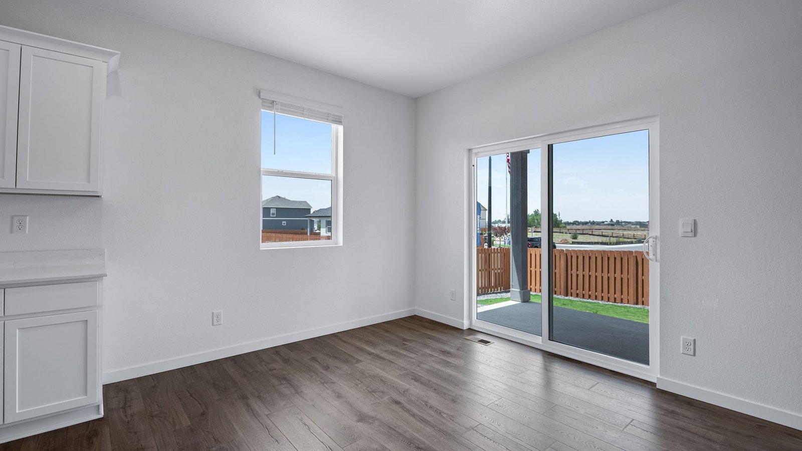 dining room with access to bakyard in new fort lupton, co home