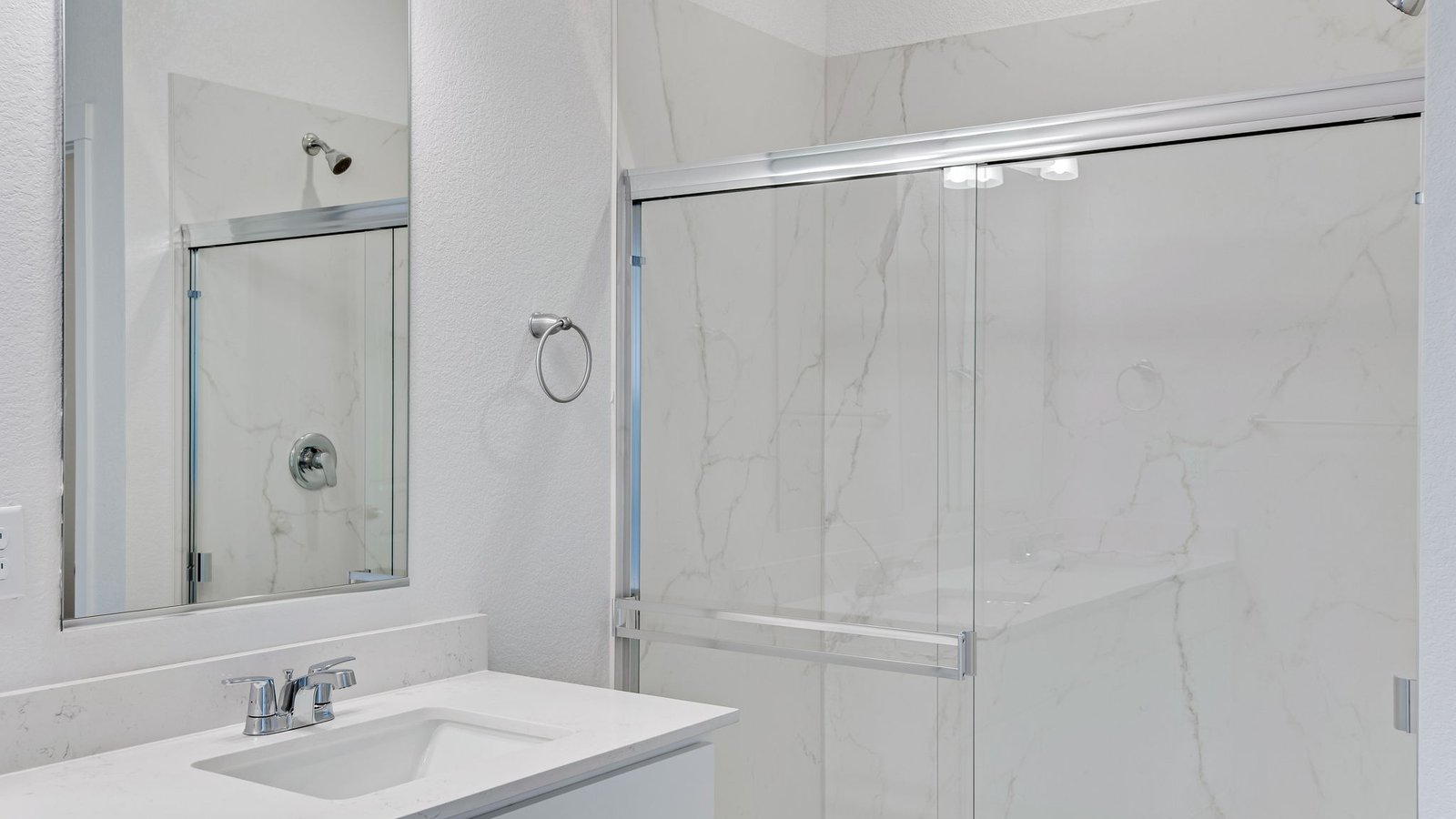 full bathroom with shower in new conswtruciton home