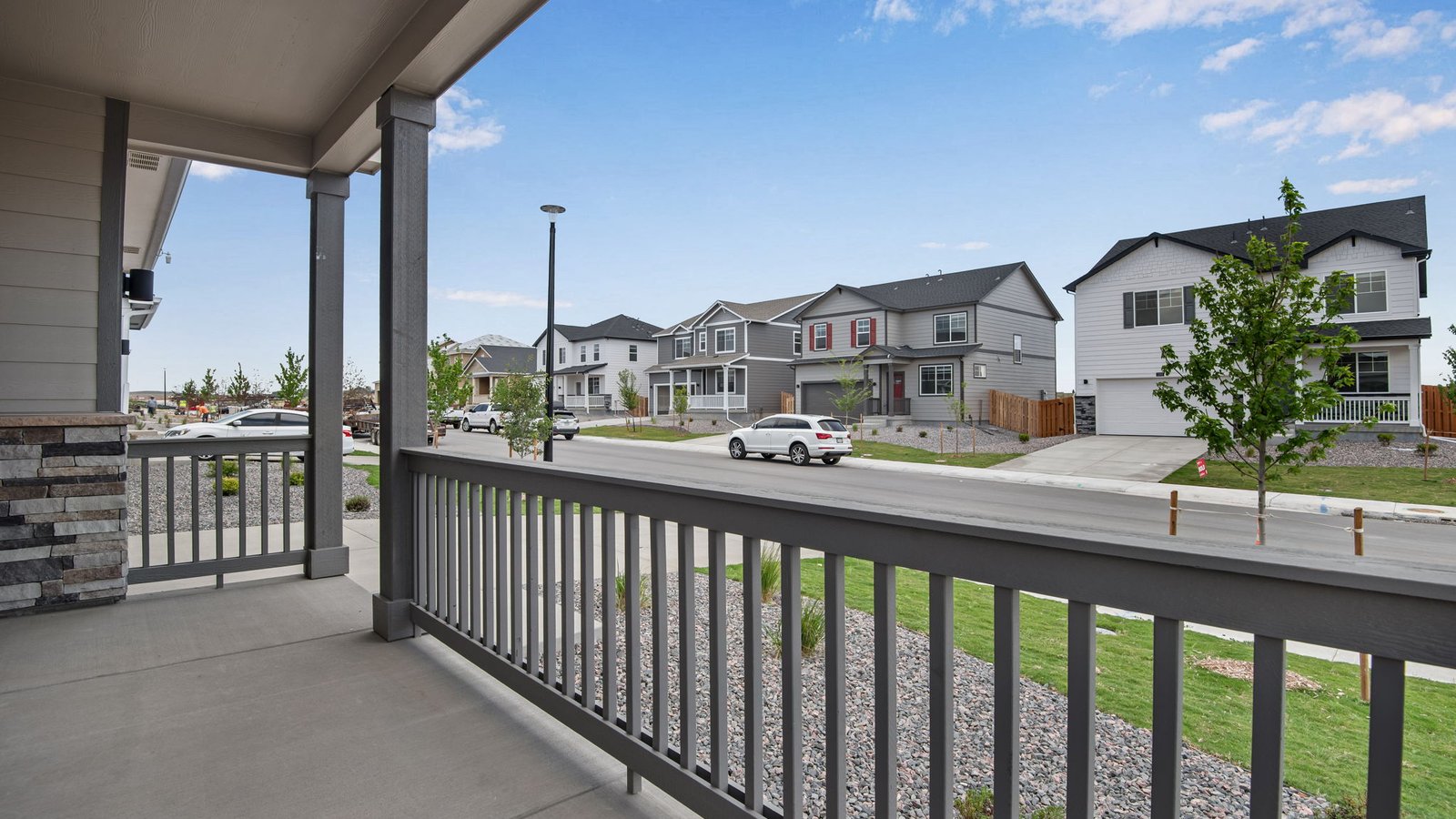new construction home front porch in fort lupton, co