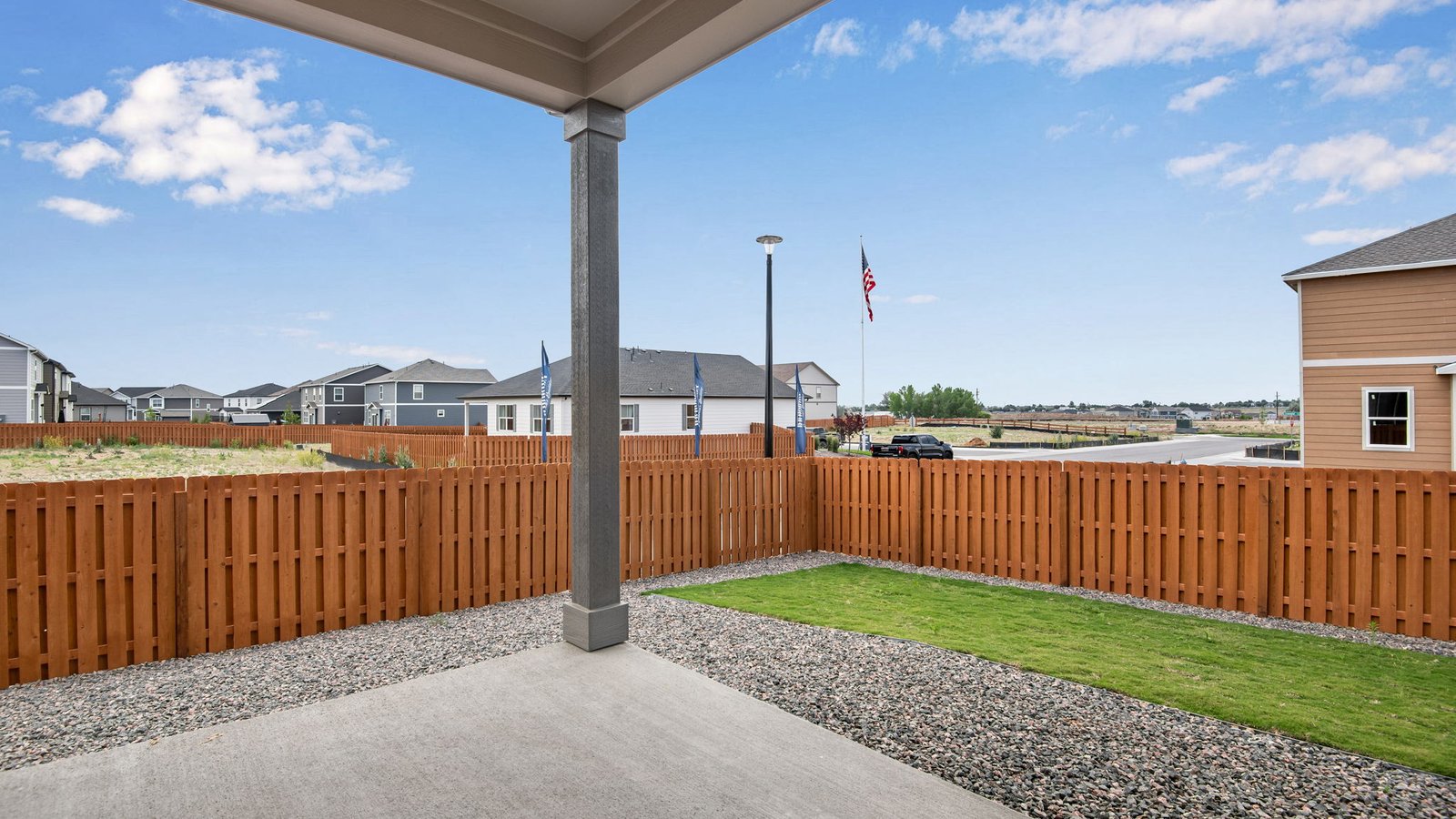 back covered porch of fort lupton home by d.r. horton