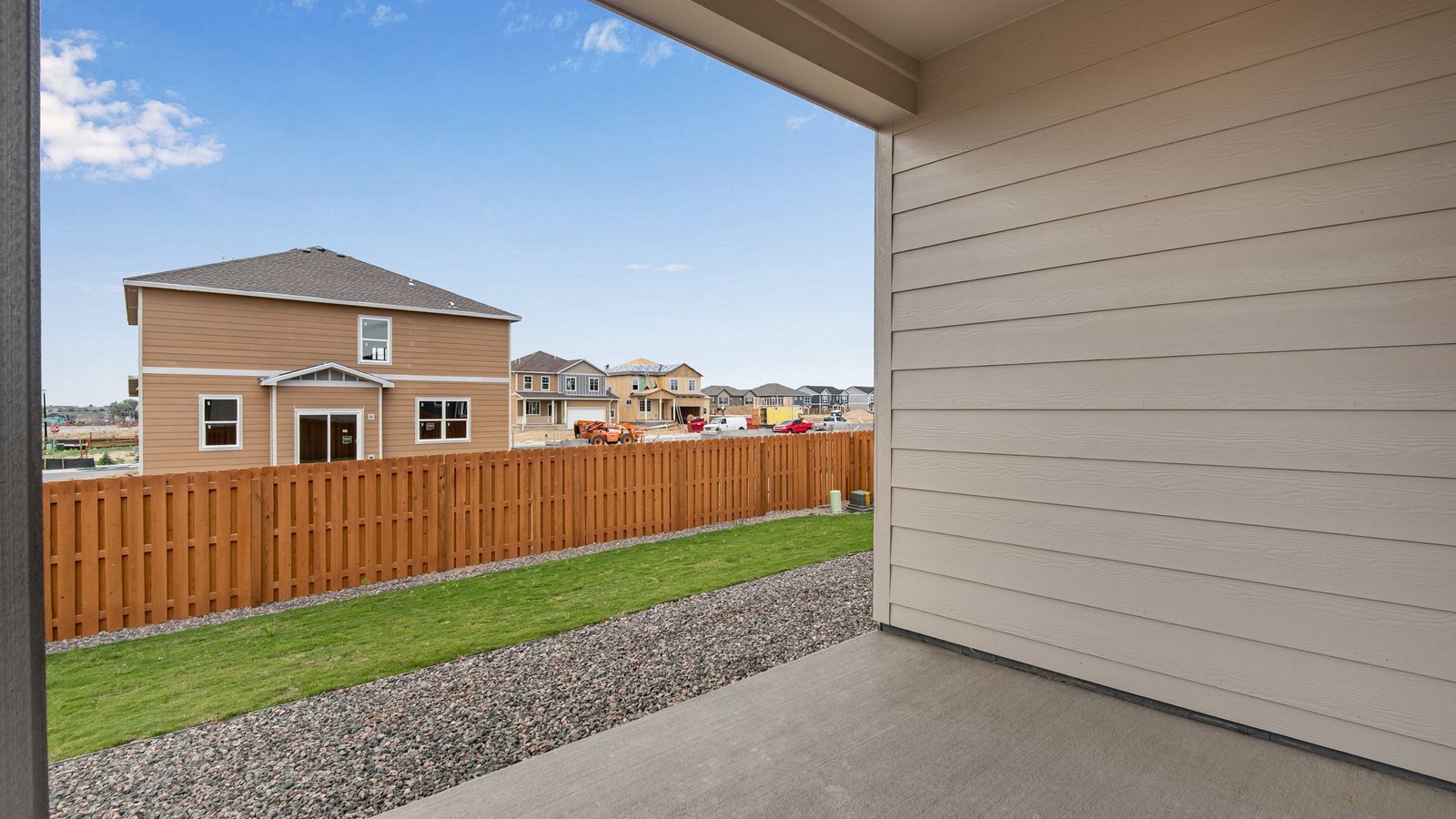 backyard and covered back porch of fort lupton home
