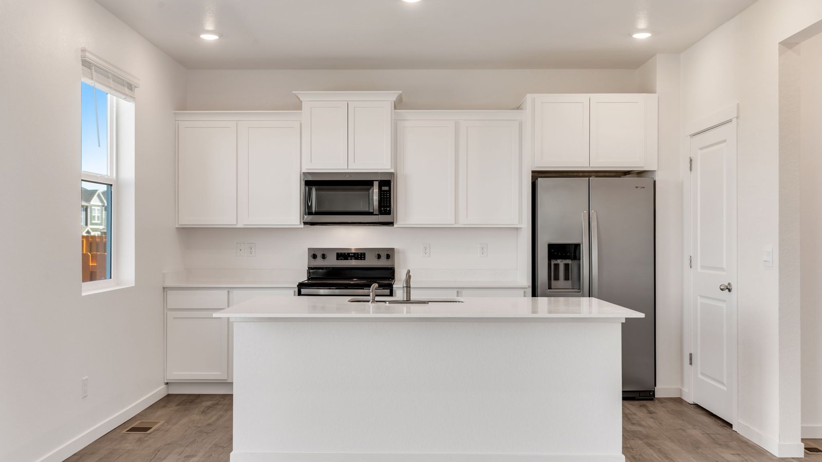 Spacious kitchen island perfect for entertaining in new Bellamy floor plan