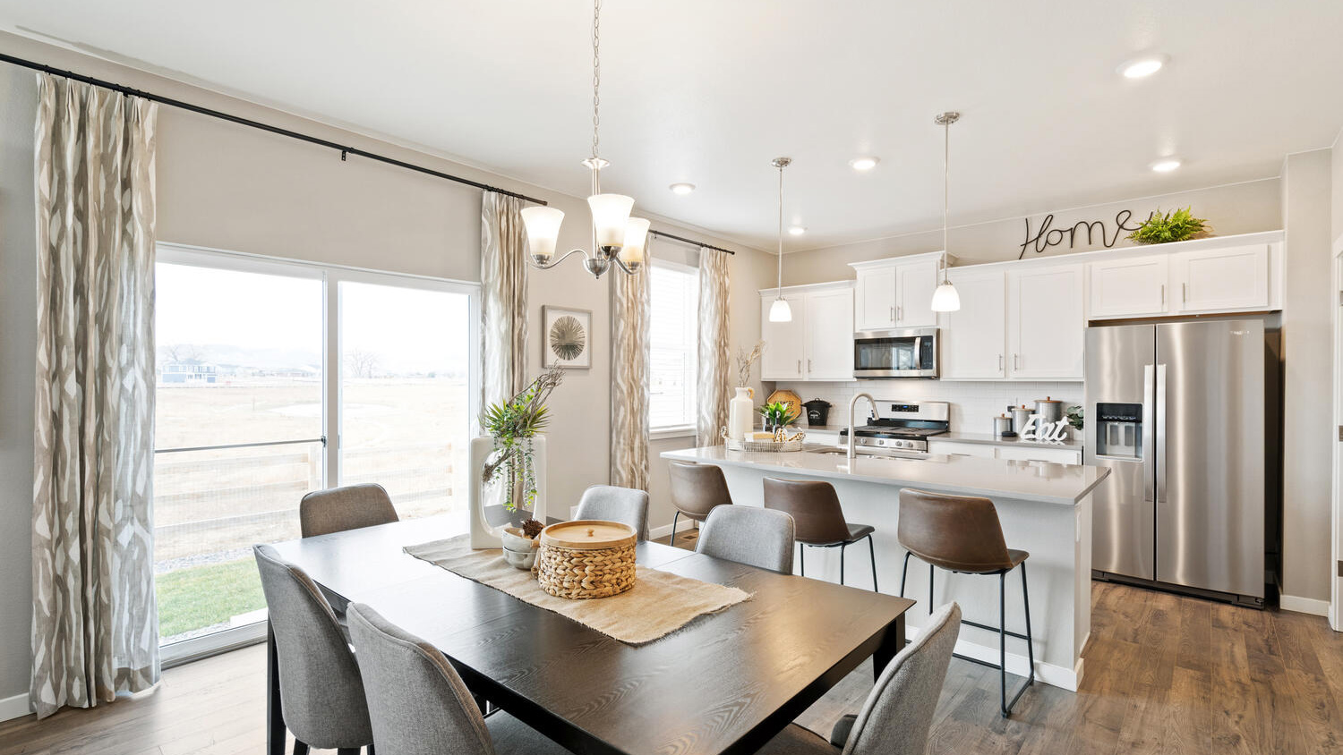 Dining room attached to kitchen in open concept layout
