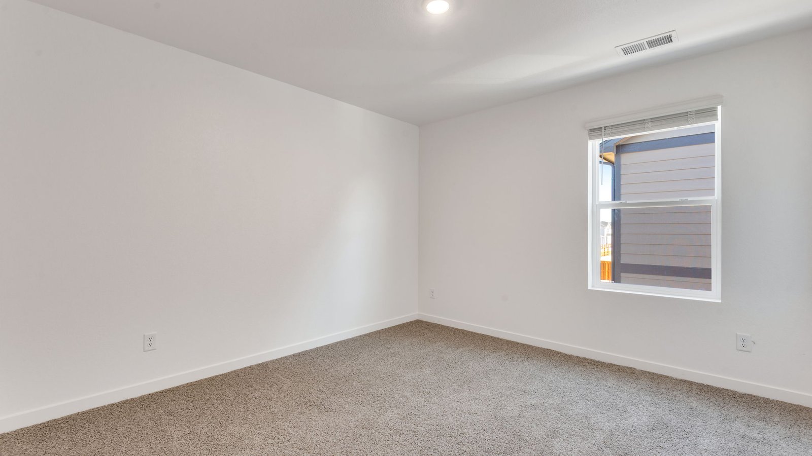 Secondary bedroom in new home in Fort Lupton, Colorado