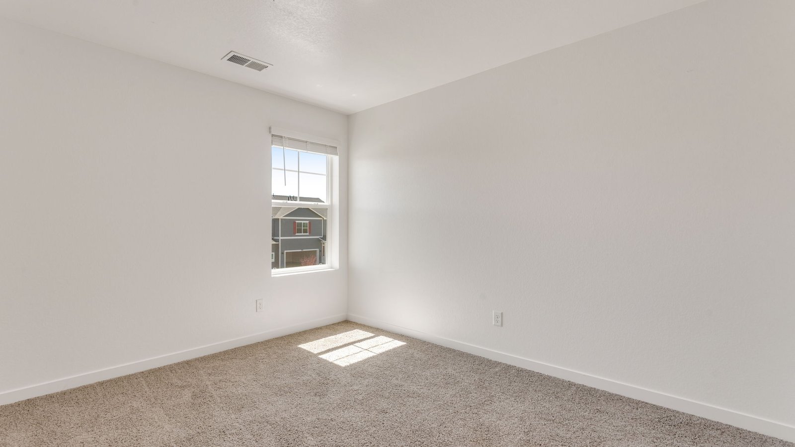 Secondary bedroom in new home in Fort Lupton, Colorado