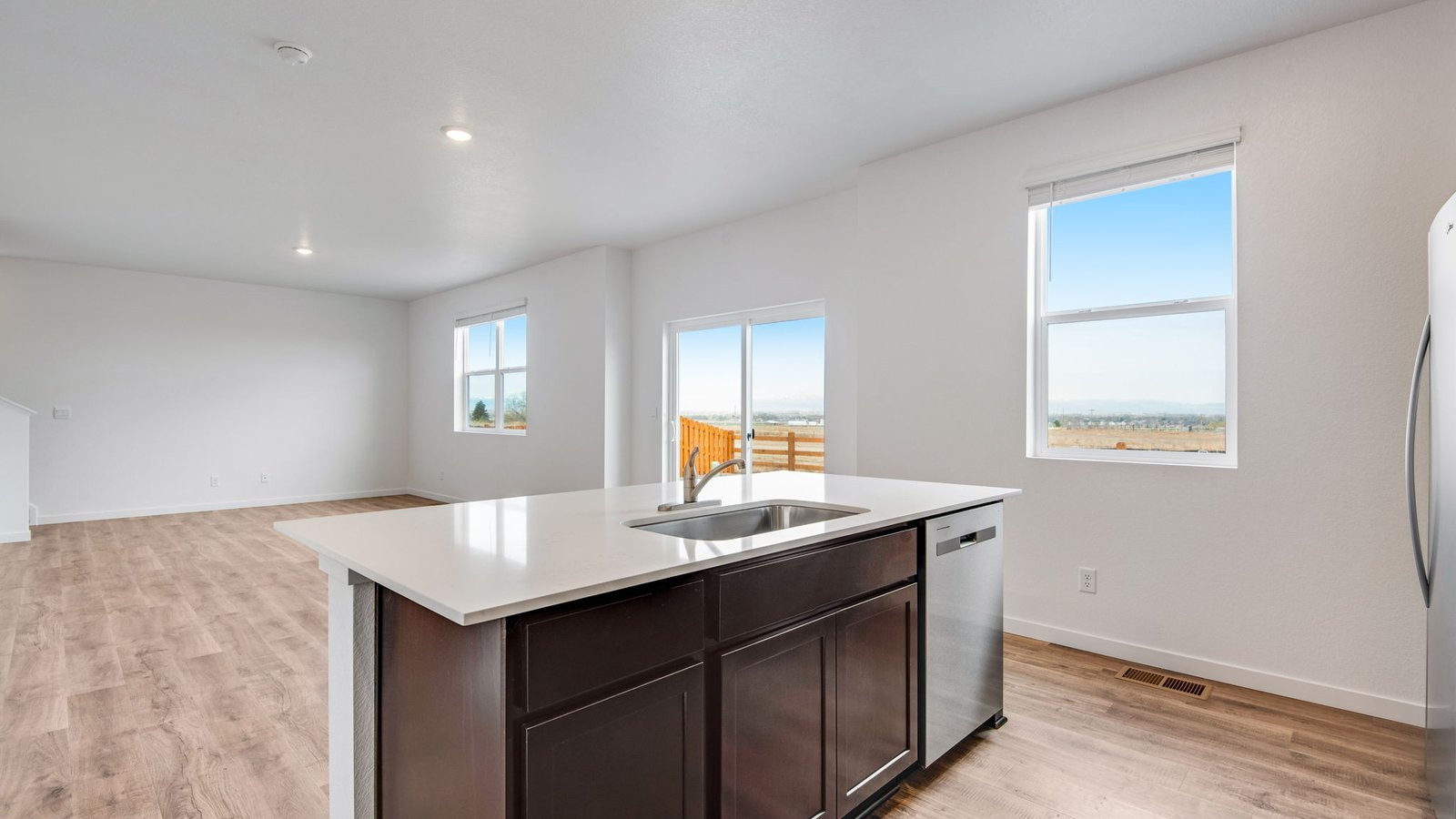 Kitchen island perfect for entertaining in new home in Fort Lupton, Colorado
