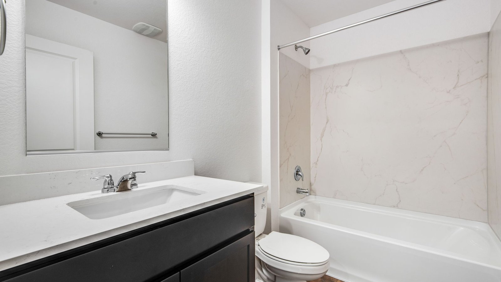 Secondary bathroom in new home at Vista Meadows community in Fort Lupton, Colorado