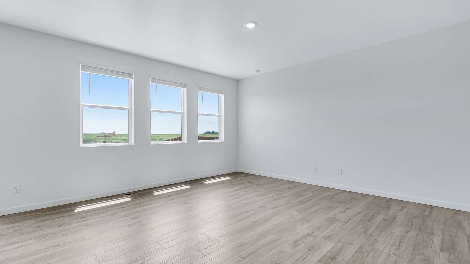 Large windows in new living room at Fort Lupton Colorado