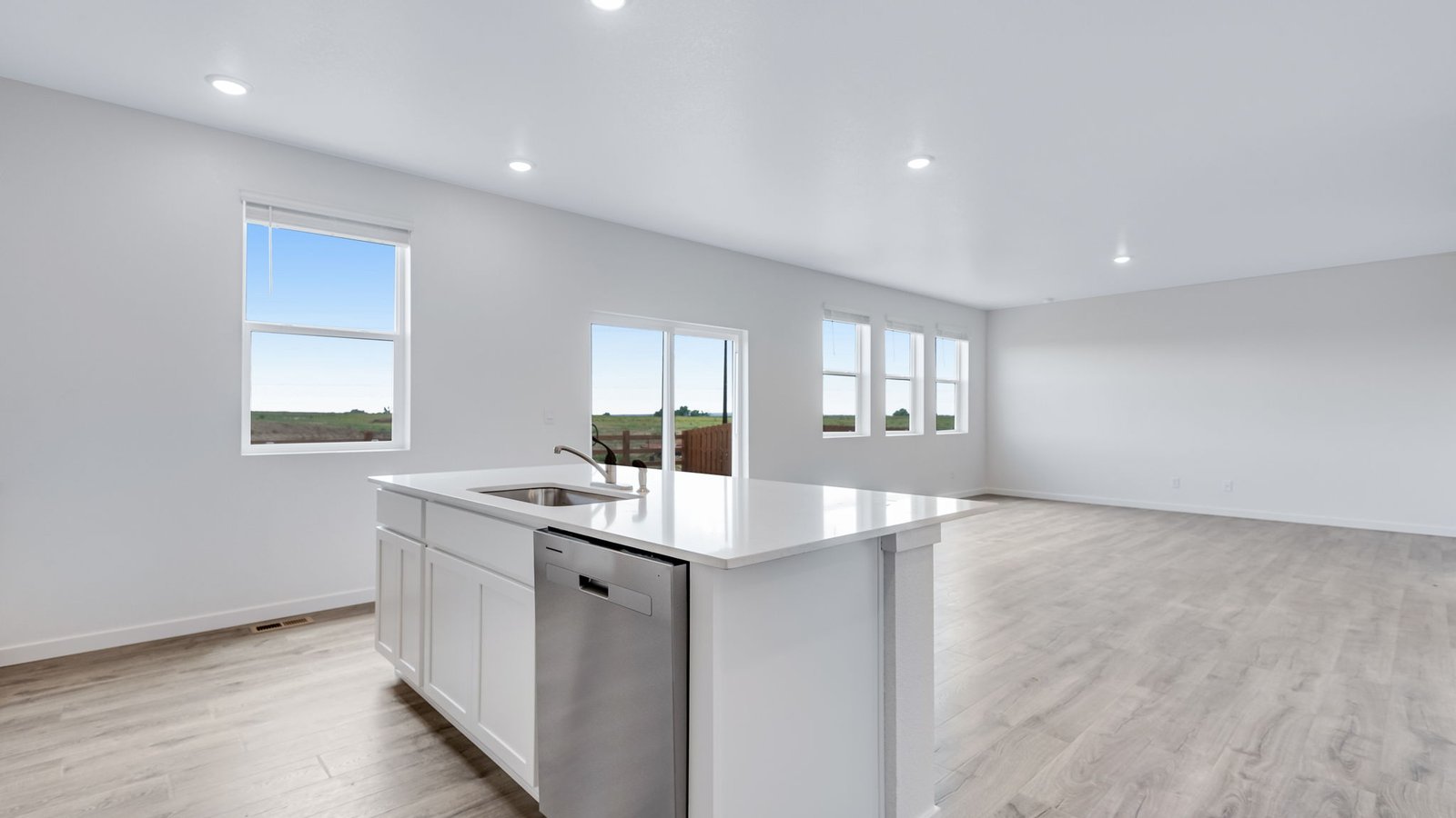 Spacious kitchen island perfect for entertaining with natural light in Colorado