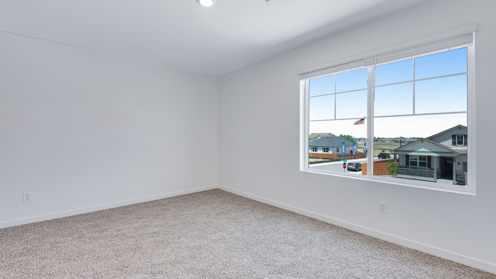 Secondary bedroom with large windows in Bridgeport floor plan