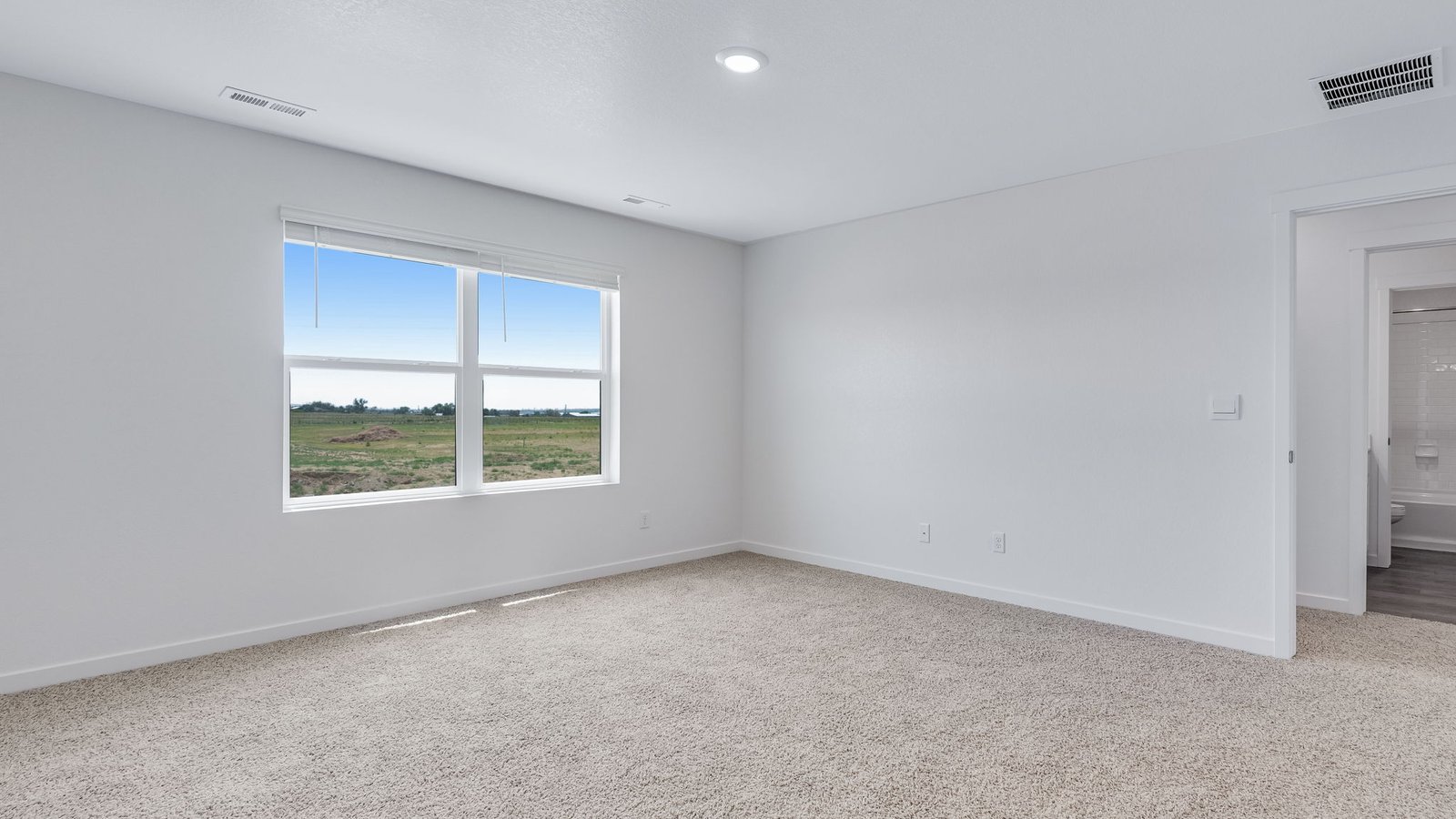 Private primary suite with generous layout and comfortable design