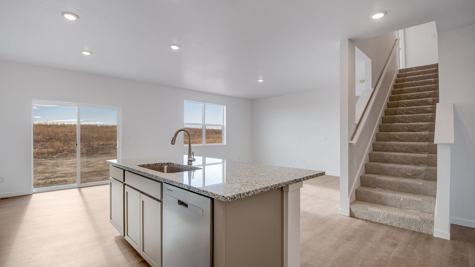 Kitchen with island in new home