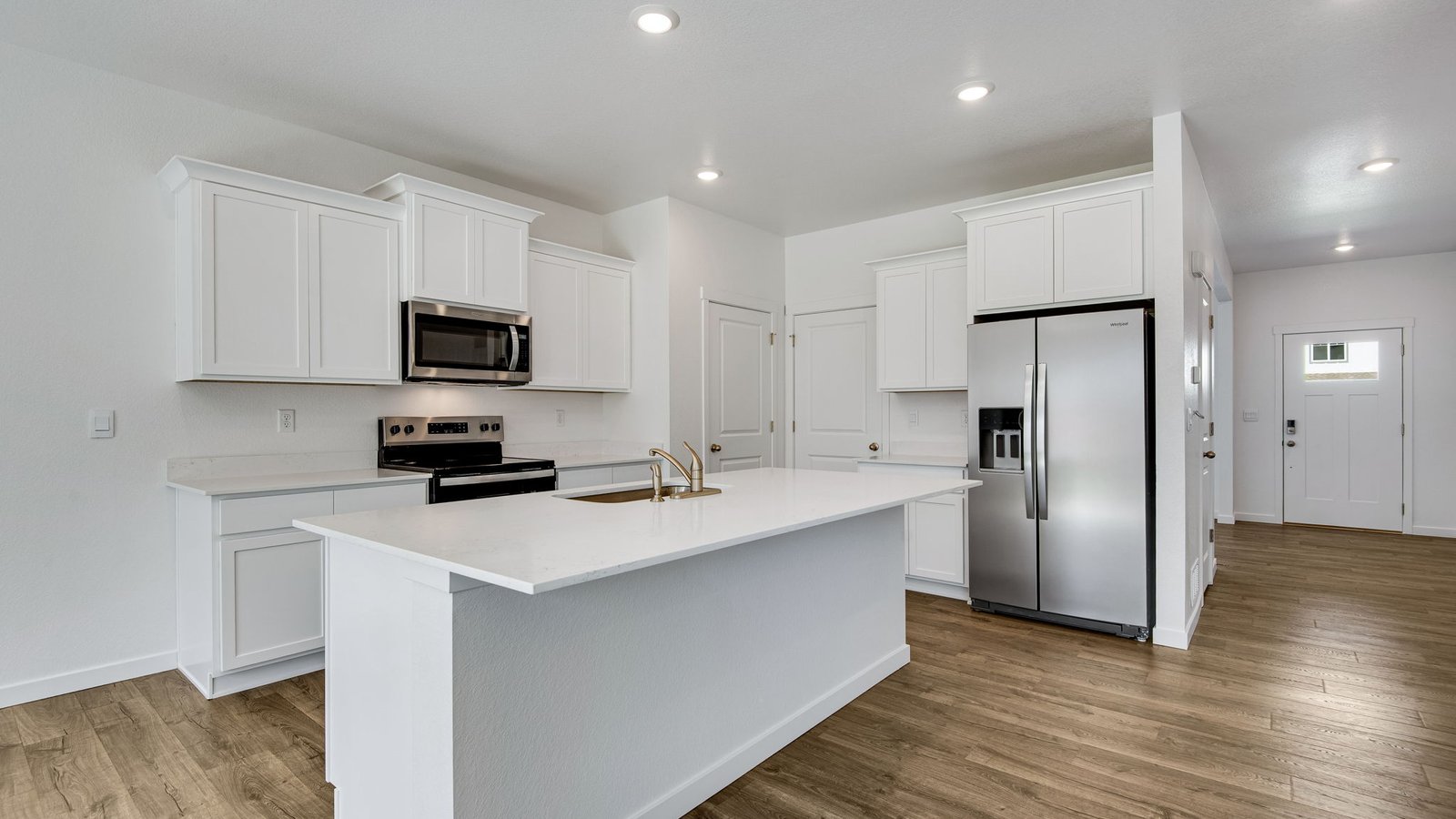 Spacious Kitchen with new appliances at new home in Fort Lupton Colorado