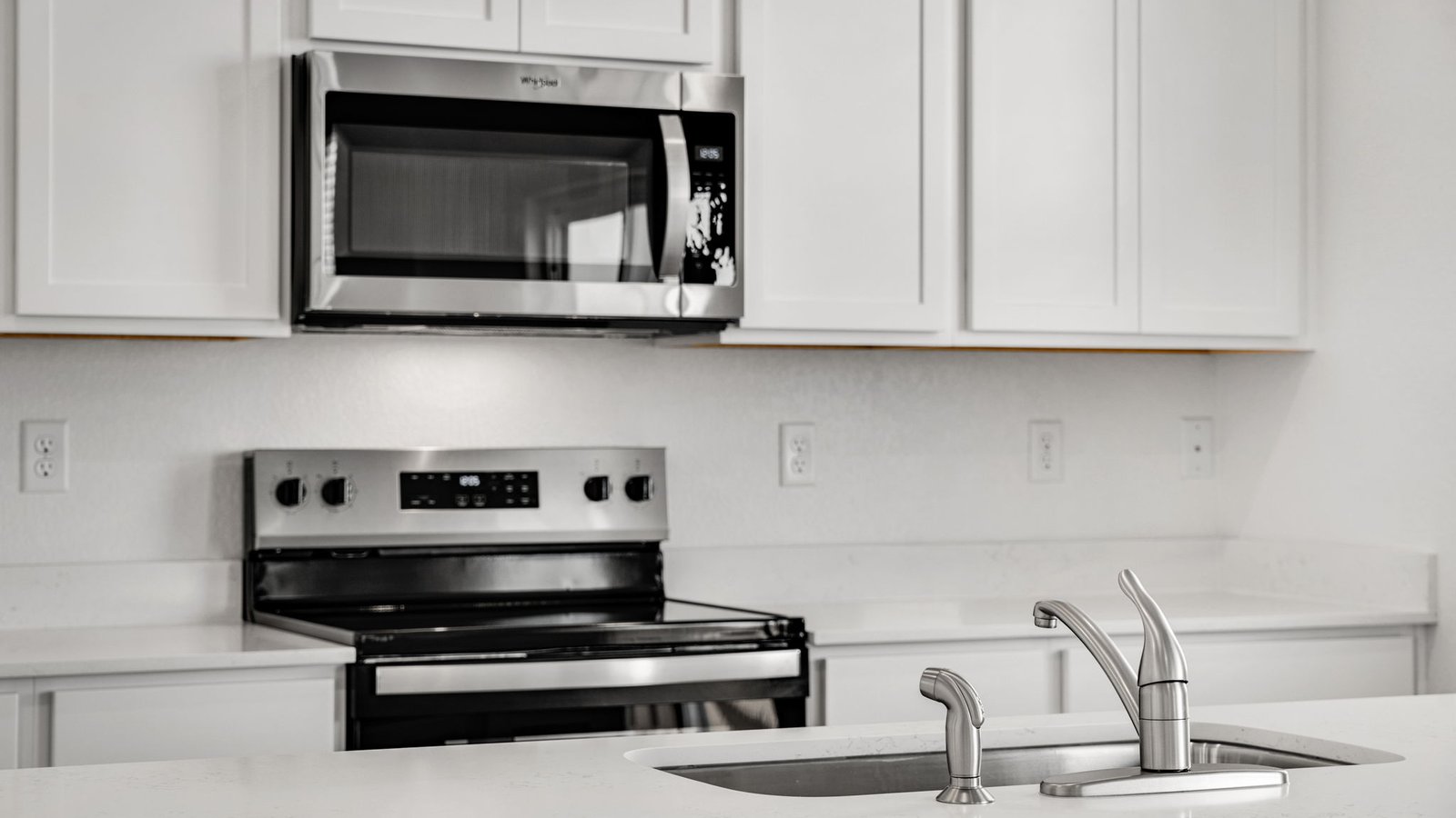classic white kitchen cabinets in new construction home colorado