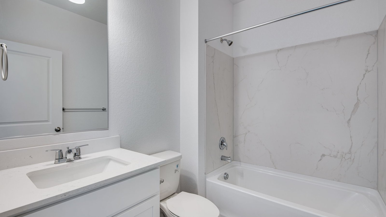 full bath with tub in new construction home by d.r. horton