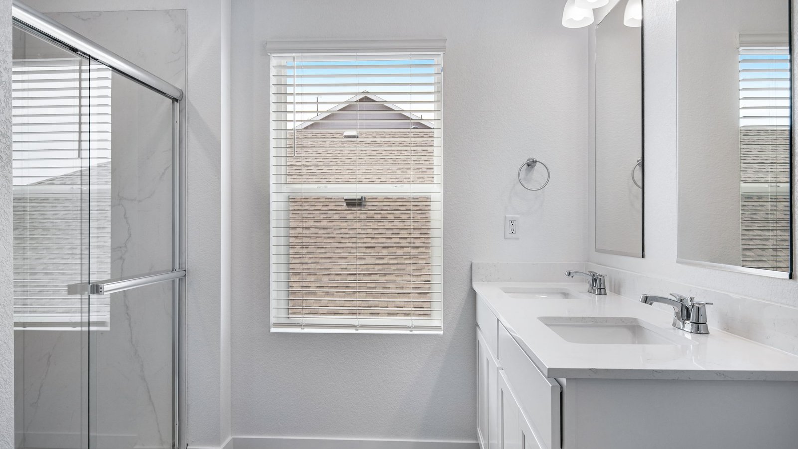 window in primary bath of new fort lupton home