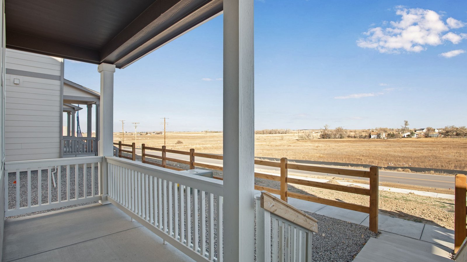 Front porch patio view of new paired home by D.R. Horton in Fort Lupton, CO