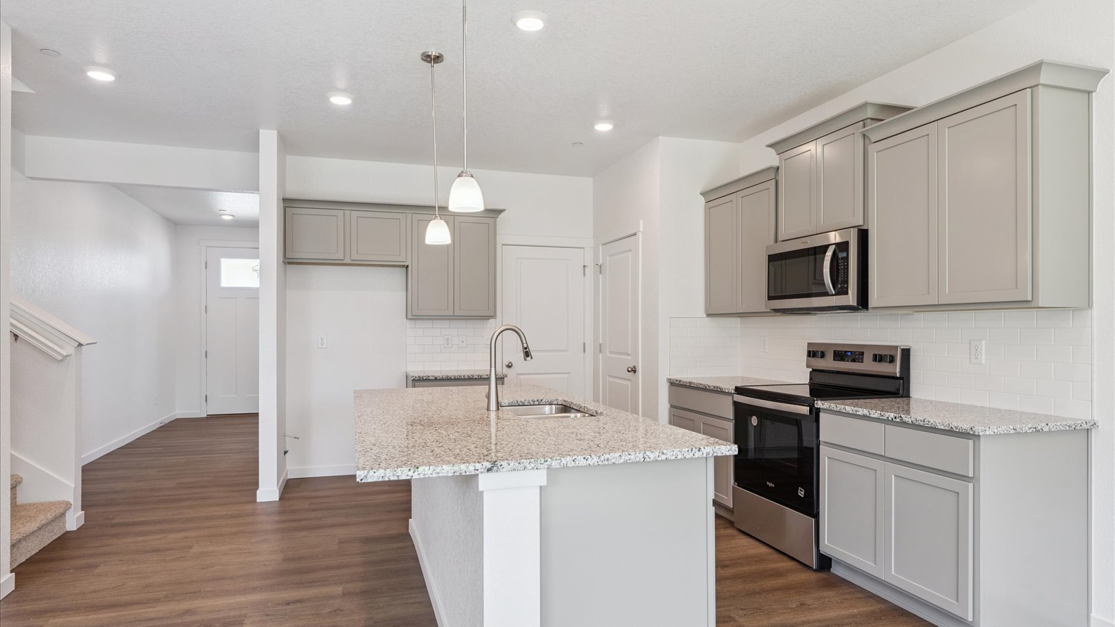 Kitchen with gray cabinets