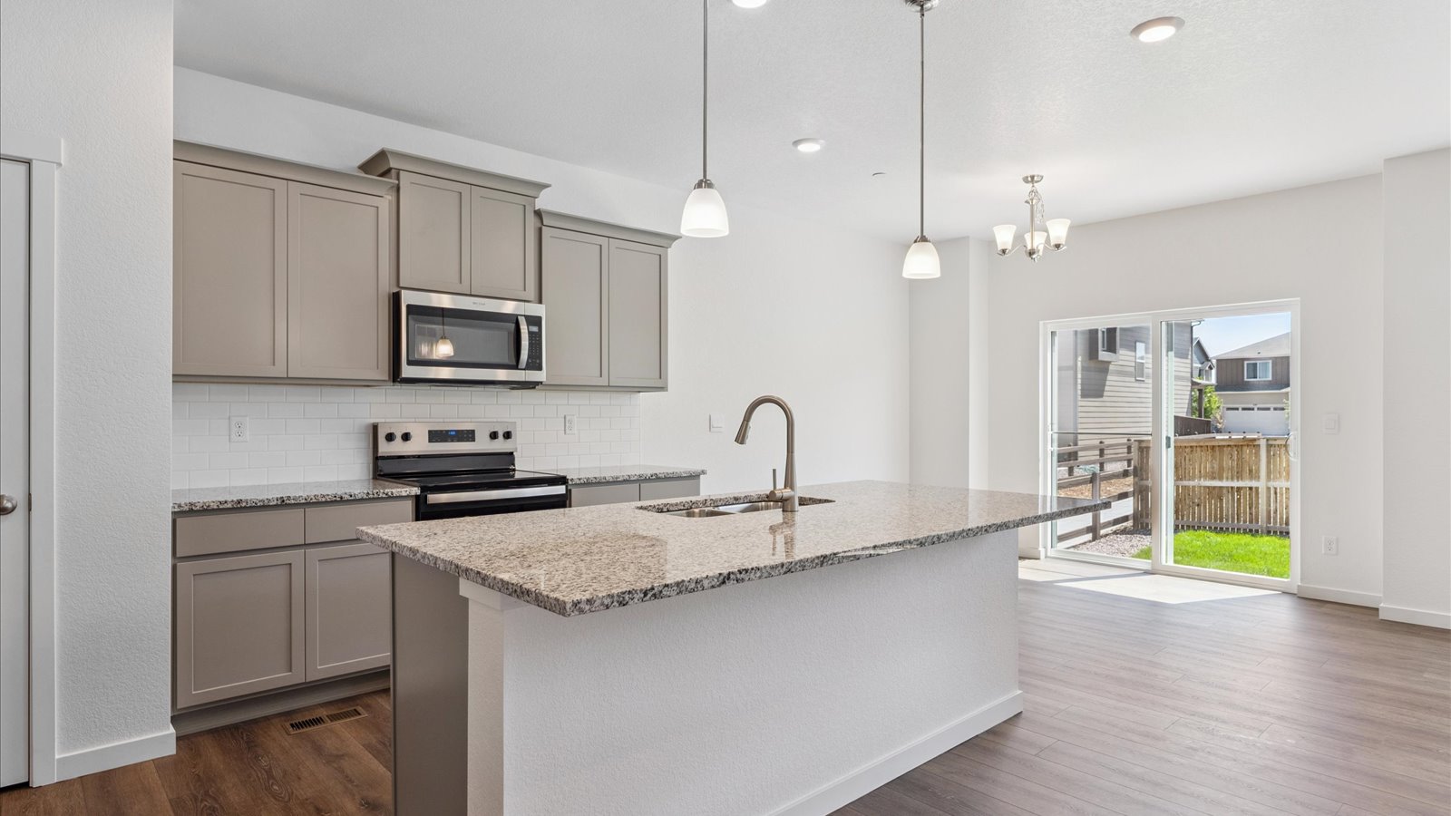 Kitchen with gray cabinets