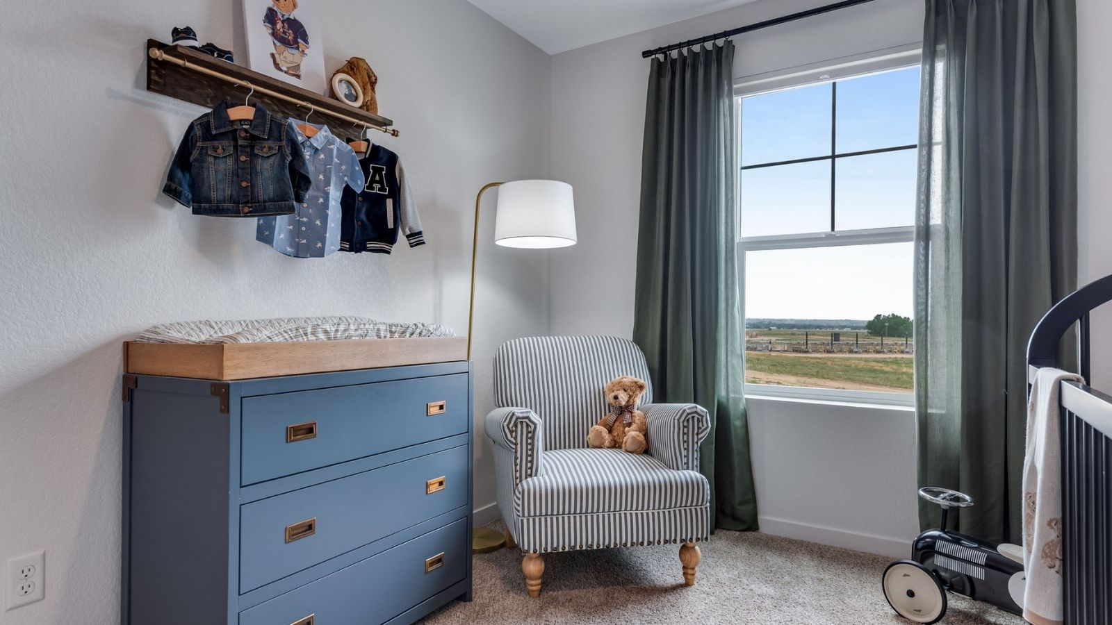 guest bedroom with large window in new d.r. horton home fort lupton, co