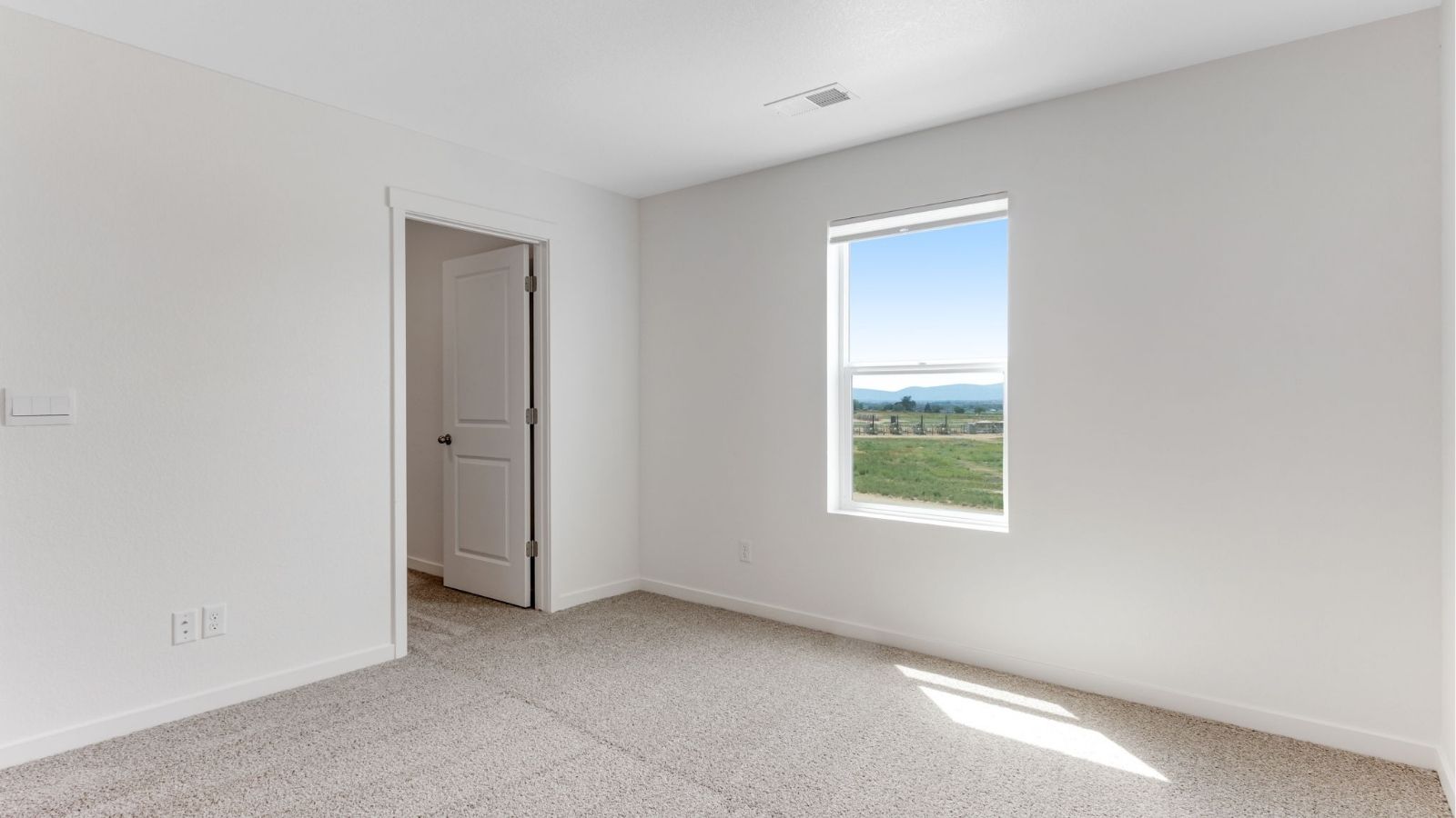 Secondary bedroom at new home in Fort Lupton community Vista Meadows