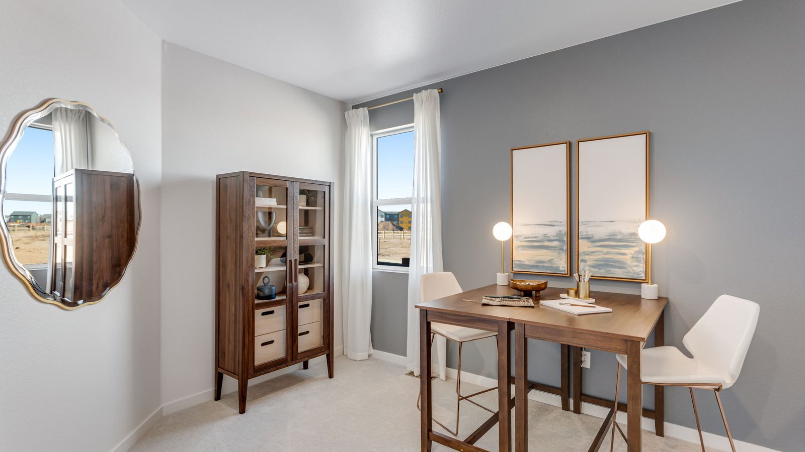 Well-appointed secondary bedroom located near a dual-sink bathroom.