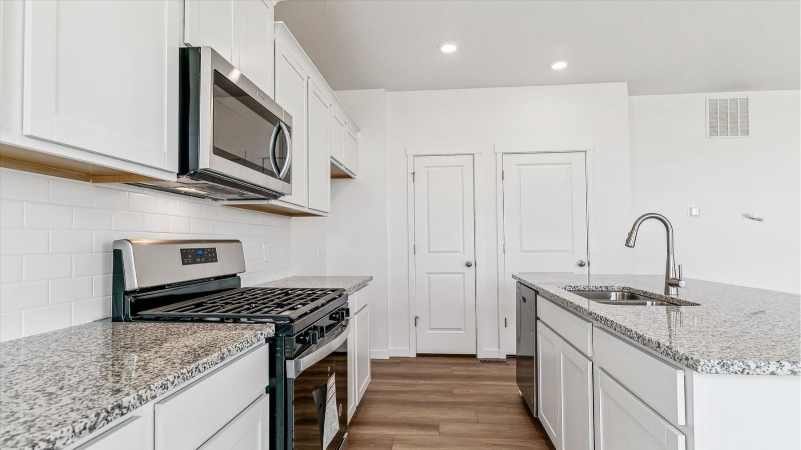 Main living space with open layout designed for everyday living and entertaining in a new Johnstown home.