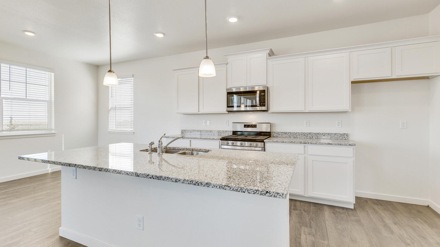 kitchen with white cabinets in new home