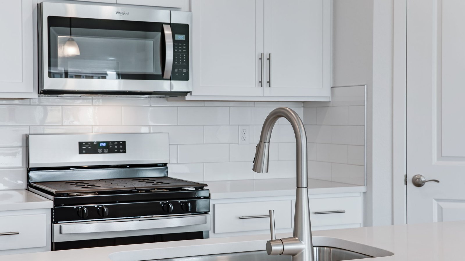 Modern kitchen with white cabinets