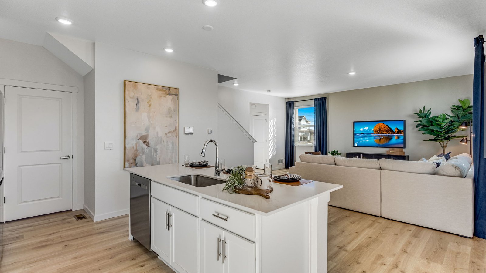 Open-concept kitchen designed for entertaining with oversized island seating.