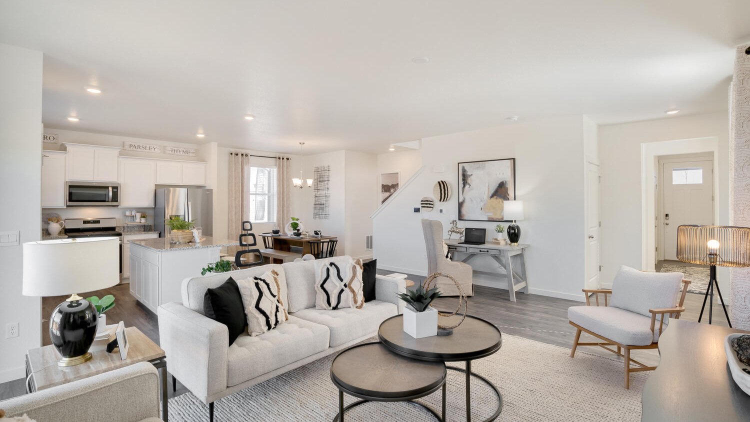Bright living area in the Elder home connected to the kitchen and dining space for effortless entertaining.