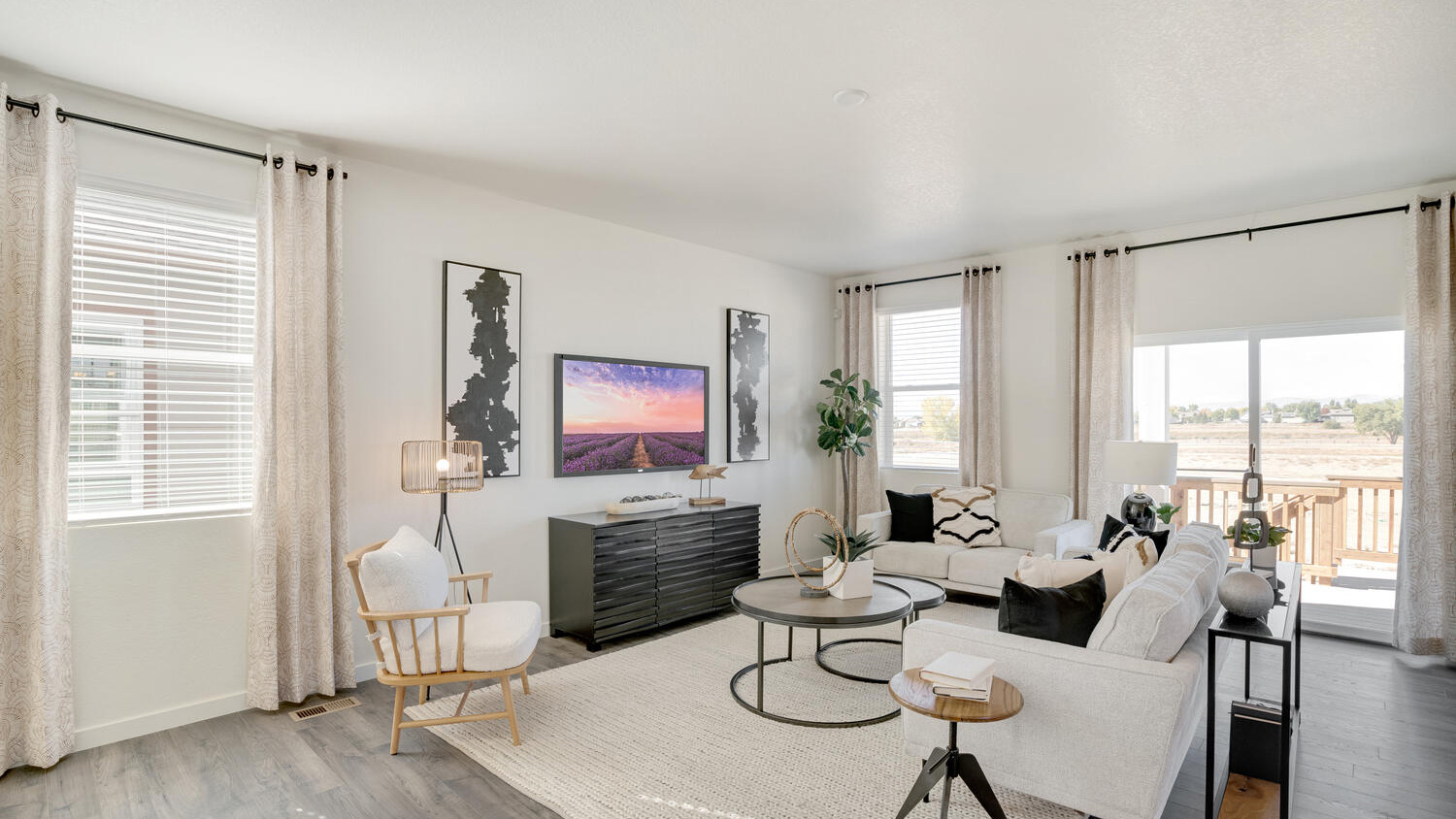 Open-concept great room in the Elder floor plan designed for gathering, relaxing, and everyday comfort.