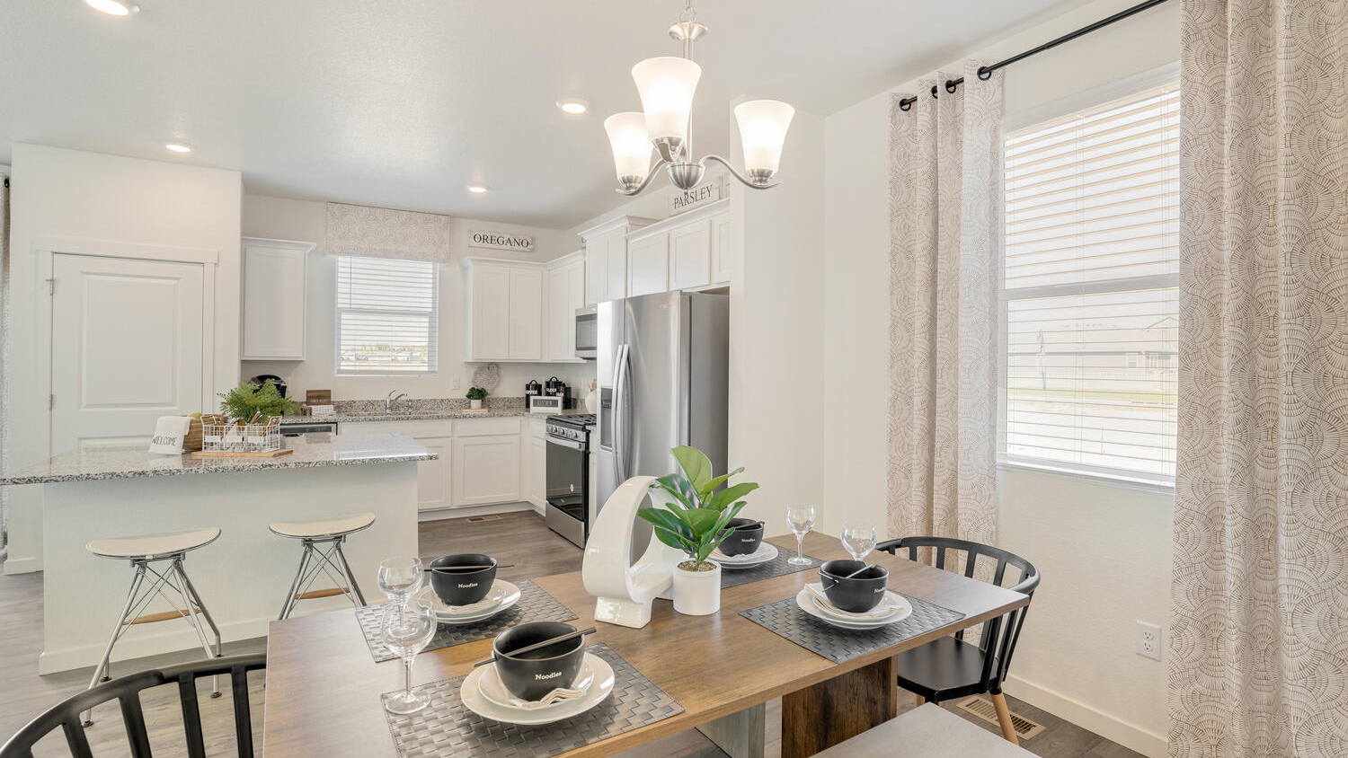 dining and kitchen of new new home by d.r. horton colorado