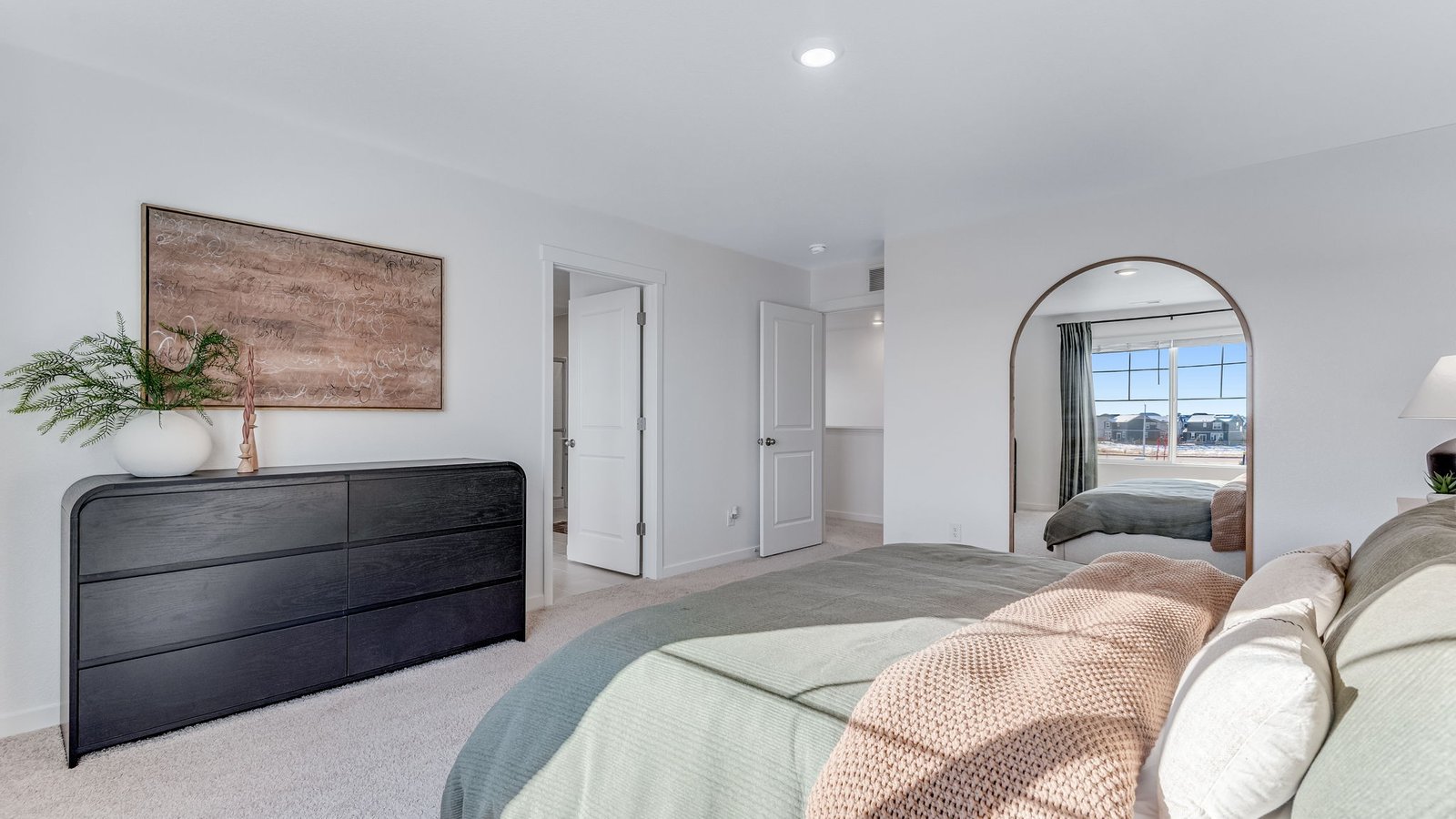primary bedroom with walk-in closet in severance, co