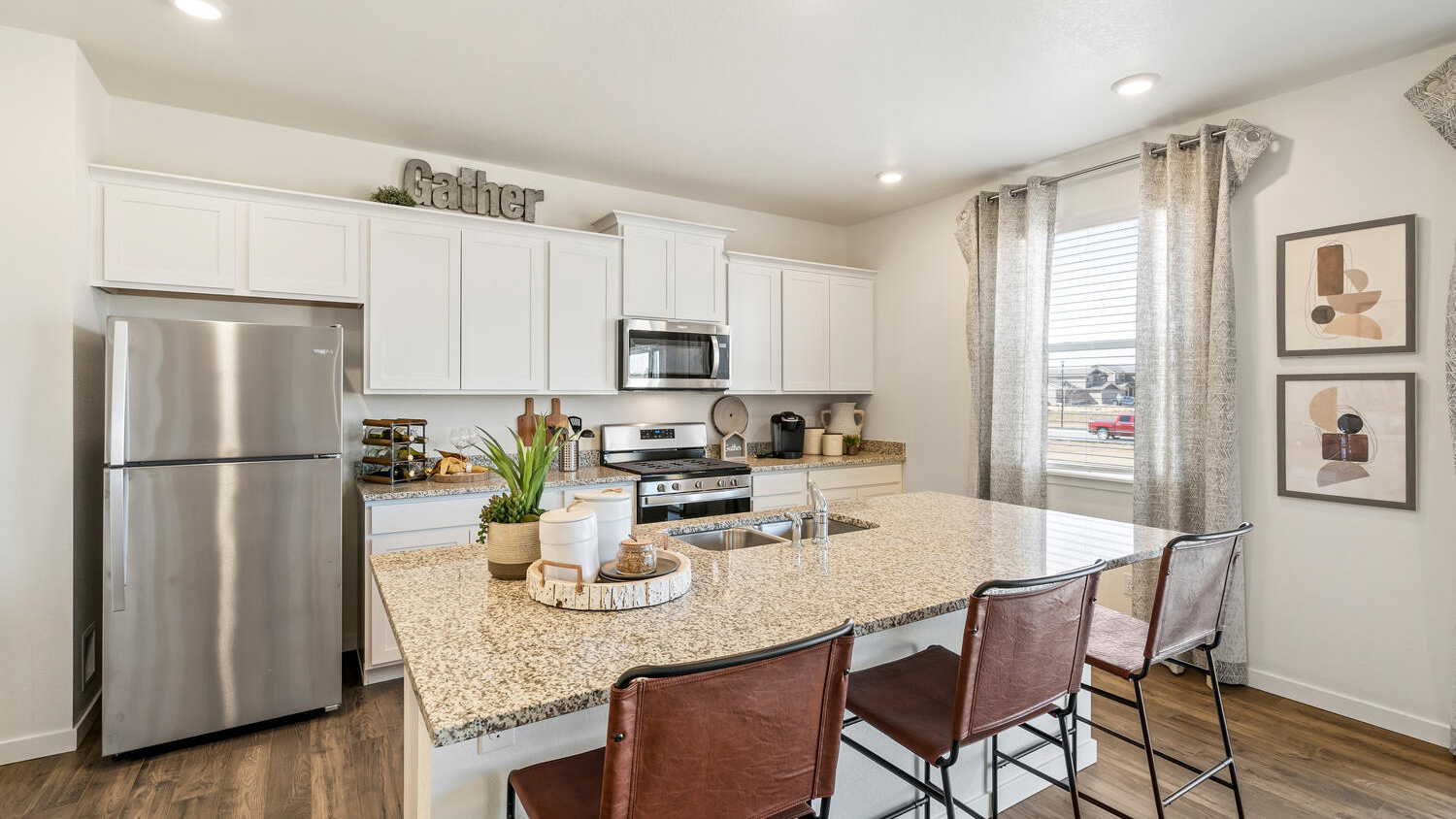 Kitchen with kitchen island in new home