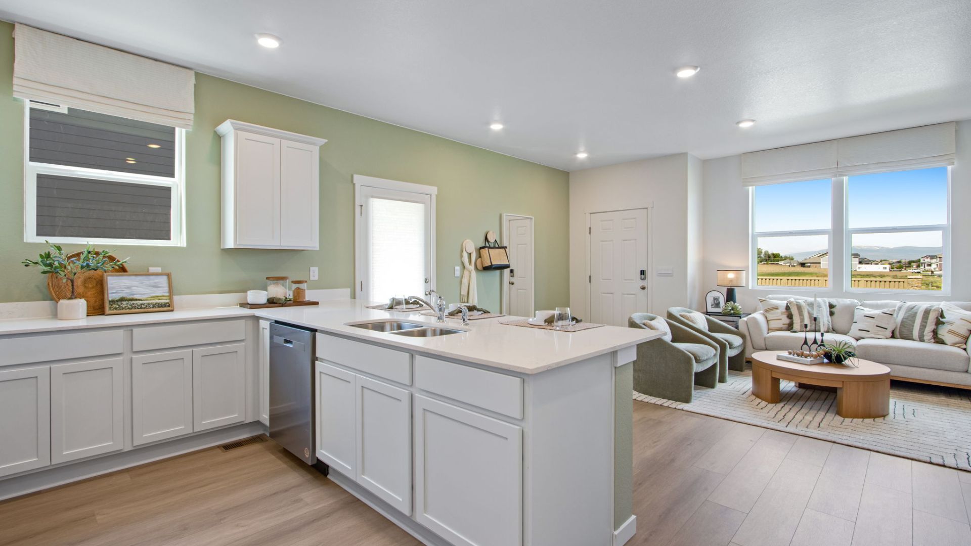 Inviting great room with modern finishes and comfortable gathering space for entertaining.