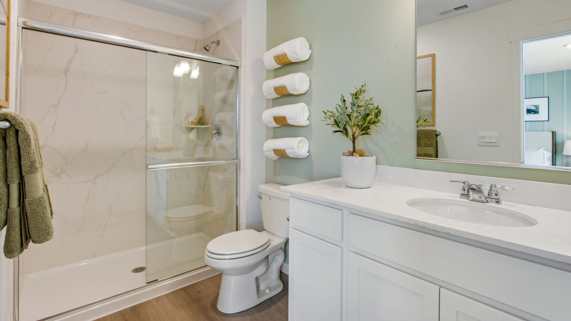Private ensuite bathroom in the New Haven primary suite with modern fixtures.