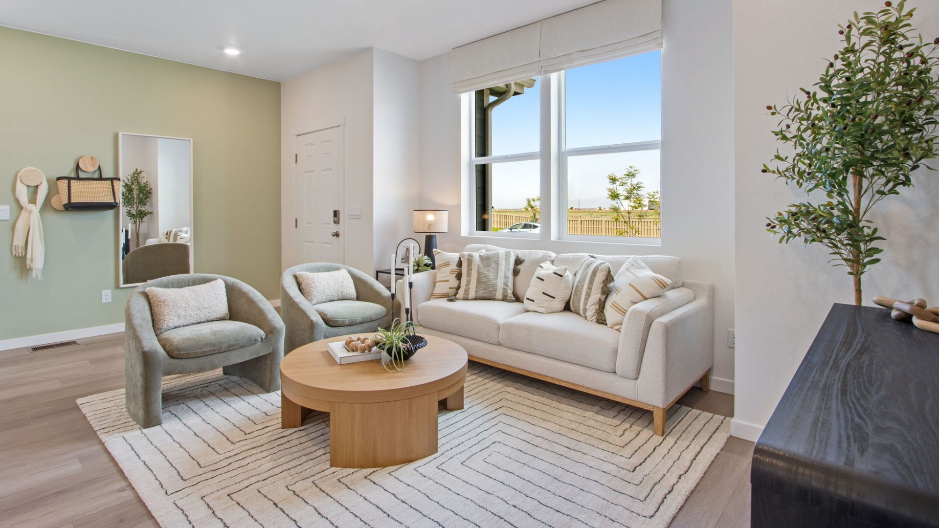 Spacious great room in the New Haven floor plan with open-concept design and abundant natural light.